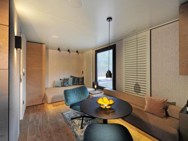 Ferienparadies Natterer See : photo 2 de la chambre « maison flottante » mobilheim