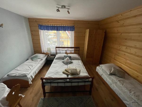 Pokoje Gościnne U Babci : photo 2 de la chambre chambre quadruple avec lit double