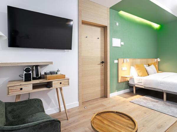 Vallecas Suites by Olala Homes : photo 5 de la chambre chambre triple