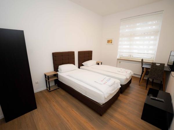 Design Apartments 2 : photo 10 de la chambre chambre lits jumeaux standard avec salle de bains commune