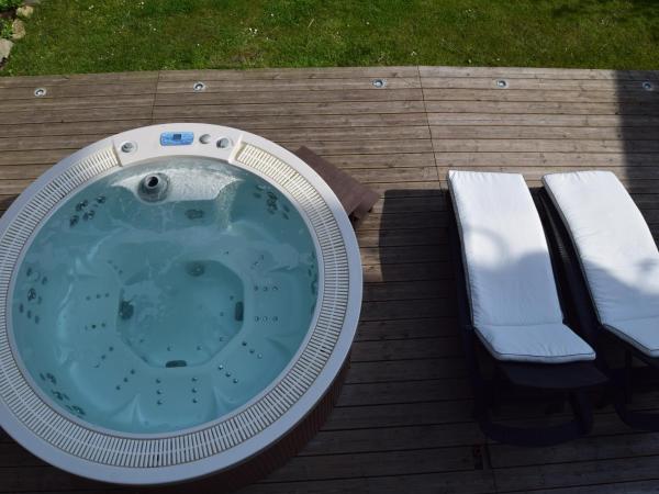 Au coin du spa : photo 6 de la chambre suite familiale premium