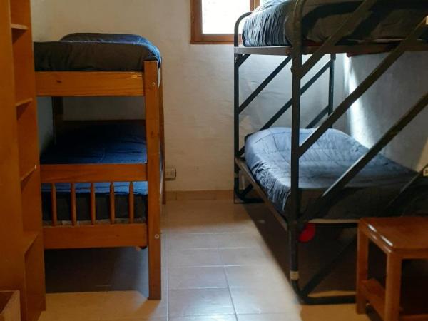 Hostel Los Coihues : photo 3 de la chambre chambre quadruple standard