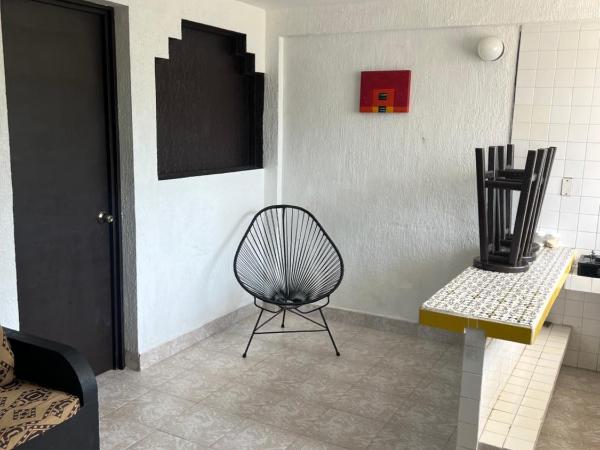 Hotel magallanes con cocineta 100 Metros de playa : photo 8 de la chambre chambre lits jumeaux avec salle de bains privative