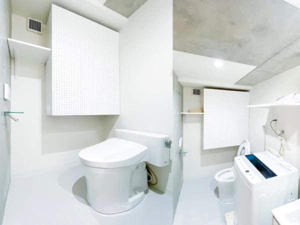 japan house nishishinjuku : photo 5 de la chambre chambre lits jumeaux - vue sur jardin