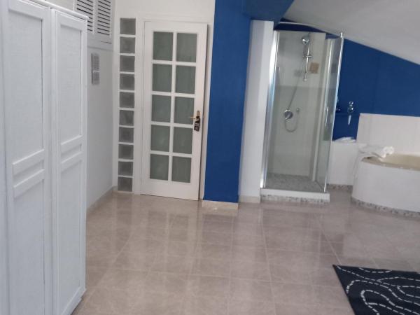 Wendy House Apartament : photo 7 de la chambre suite deluxe avec baignoire spa