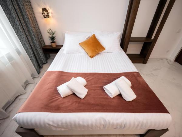 Hive Family House : photo 5 de la chambre chambre quadruple avec douche