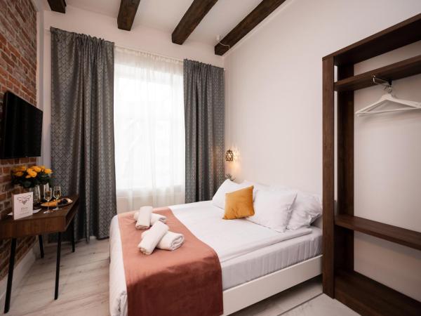 Hive Family House : photo 6 de la chambre chambre quadruple avec douche