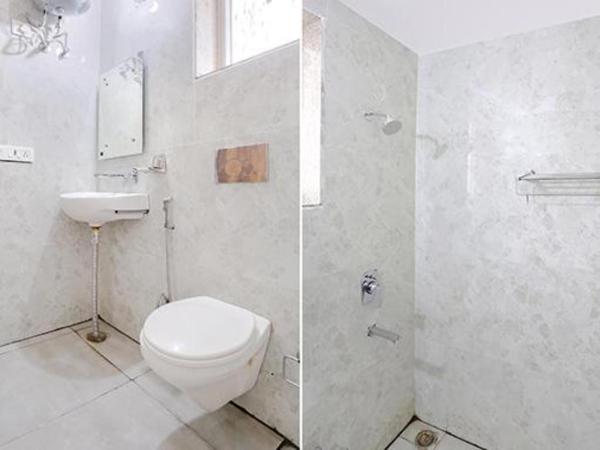 FabHotel Amrit Residency : photo 4 de la chambre chambre deluxe