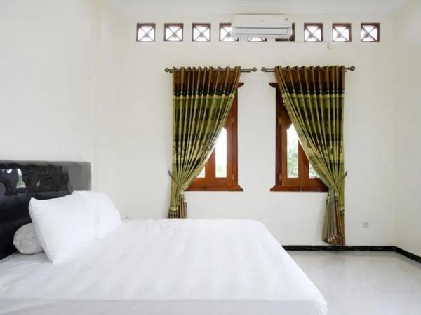 Griya Mataram Kotagede Mitra RedDoorz : photo 5 de la chambre chambre double deluxe