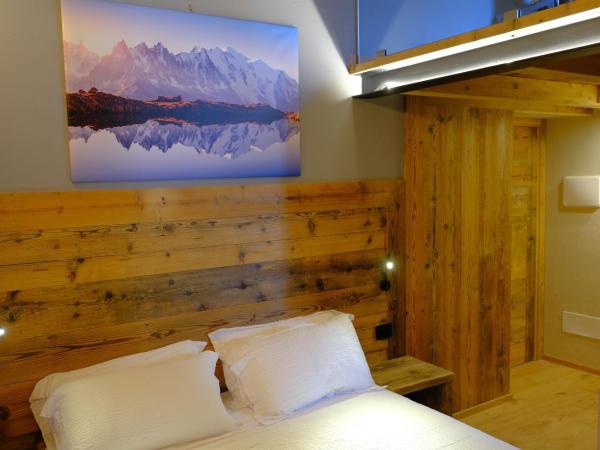 Arlette Chambres d'Hôtes : photo 6 de la chambre chambre deluxe (2 adultes + 1 enfant)