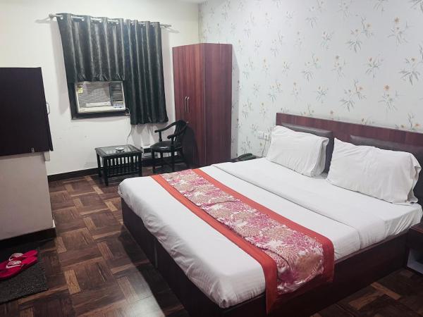 Hotel Cozy Cave Delhi Aiport : photo 1 de la chambre chambre deluxe double ou lits jumeaux