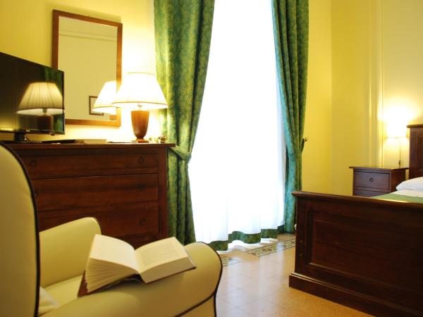 Hotel del Centro : photo 8 de la chambre chambre double ou lits jumeaux