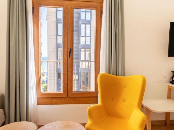 Odyssey Rooms Alicante : photo 4 de la chambre chambre lits jumeaux pour personnes à mobilité réduite