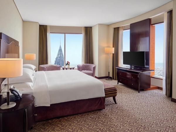 Rose Rayhaan by Rotana - Dubai : photo 5 de la chambre spacieuse chambre lit king-size - accès au salon