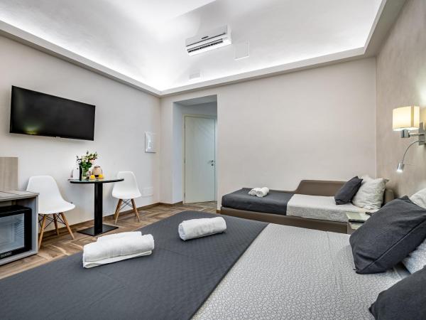 B&B Lorenzo de' Medici : photo 4 de la chambre chambre triple supérieure