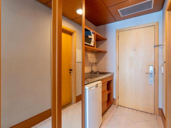 Wyndham Garden São Paulo Convention Nortel : photo 2 de la chambre hébergement supérieur avec lit queen-size et lit simple - non-fumeurs