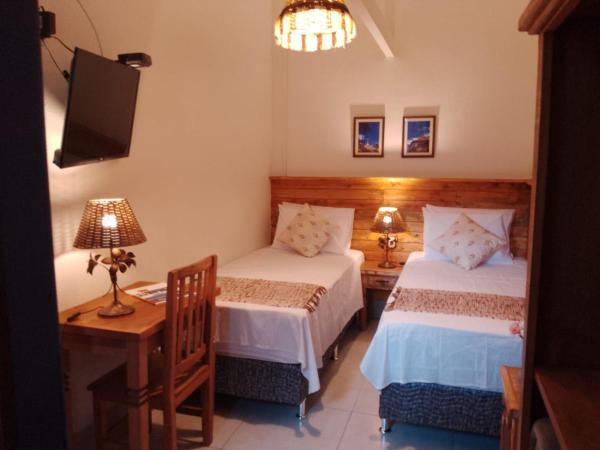 Pousada Caminhos de Minas Belo Horizonte : photo 1 de la chambre chambre double