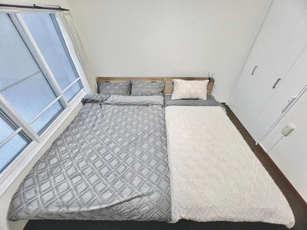 attomi hostel : photo 5 de la chambre chambre quadruple avec salle de bains