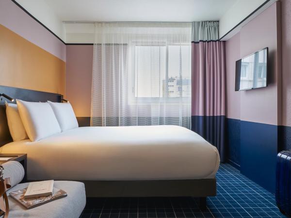 Mercure Paris 15 Porte de Versailles : photo 10 de la chambre chambre double supérieure avec canapé