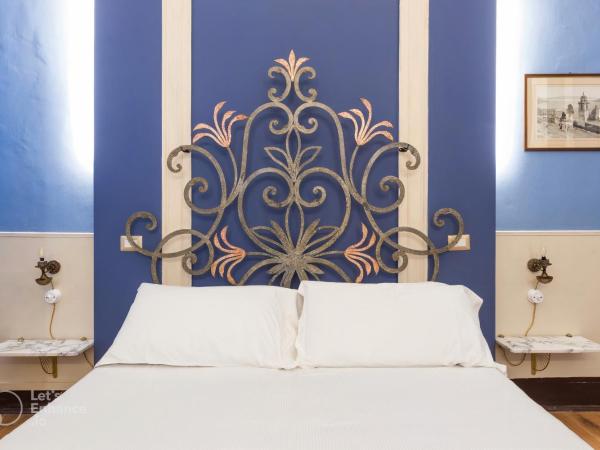 Let's B&B : photo 10 de la chambre chambre triple avec salle de bains privative