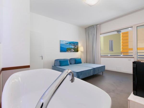 Hotel Tasso Suites & Spa : photo 5 de la chambre suite junior deluxe