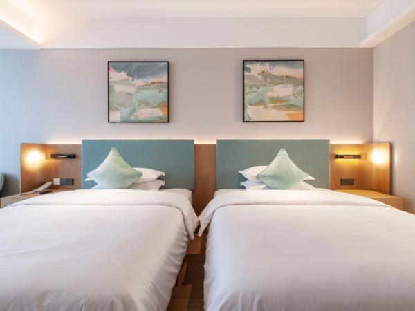 SSAW Boutique Hotel Zhijiang : photo 2 de la chambre chambre lits jumeaux deluxe