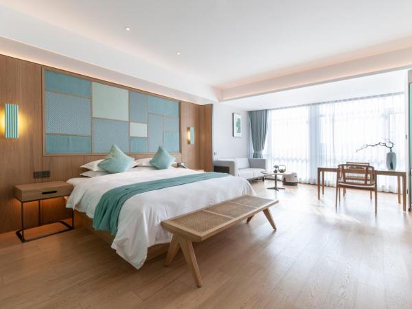 SSAW Boutique Hotel Zhijiang : photo 1 de la chambre chambre lit king-size supérieure