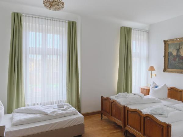 Jahrhunderthotel Leipzig : photo 2 de la chambre chambre triple