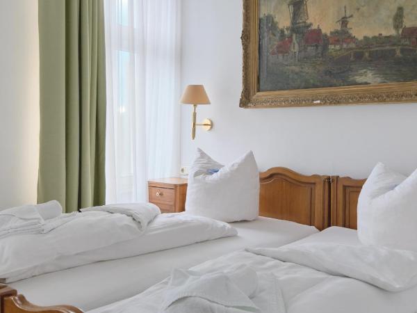 Jahrhunderthotel Leipzig : photo 3 de la chambre chambre triple