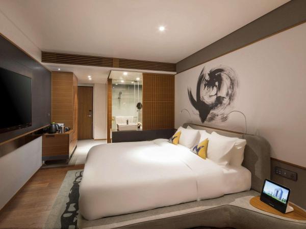 Novotel Ambassador Seoul Dongdaemun Hotels & Residences : photo 1 de la chambre chambre exécutive lit queen-size
