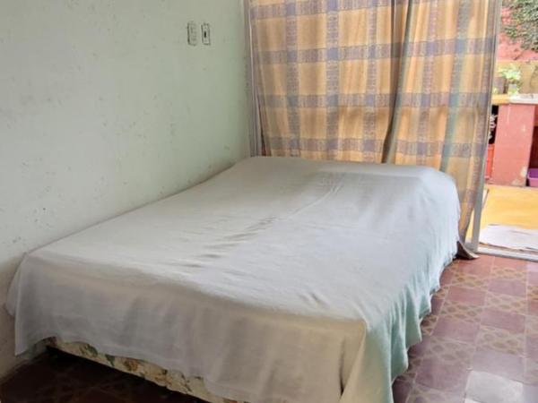 Punto Salta Hostel : photo 1 de la chambre chambre quadruple avec salle de bains privative