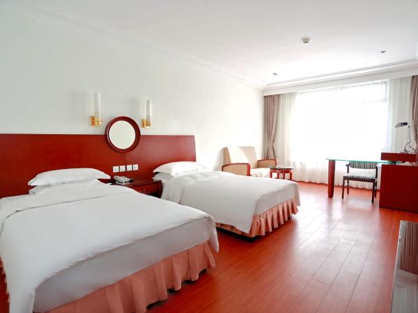 无锡花园大酒店 : photo 2 de la chambre chambre lits jumeaux - vue sur jardin