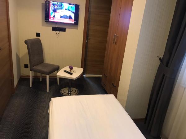 Grand Silay Hotel : photo 4 de la chambre petite chambre simple