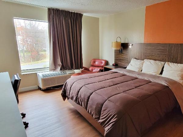 Studios & Suites 4 Less Charlotte : photo 2 de la chambre chambre lit king-size deluxe - accessible aux personnes à mobilité réduite