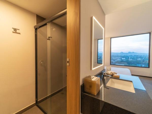 Stadía Suites Querétaro Centro Histórico : photo 9 de la chambre chambre lit king-size deluxe