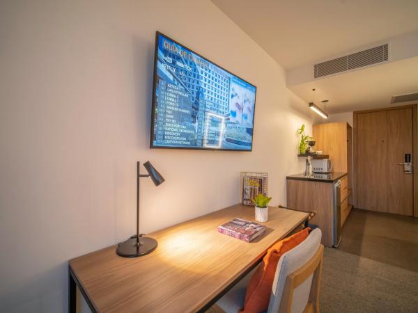 Stadía Suites Querétaro Centro Histórico : photo 1 de la chambre chambre lit king-size deluxe