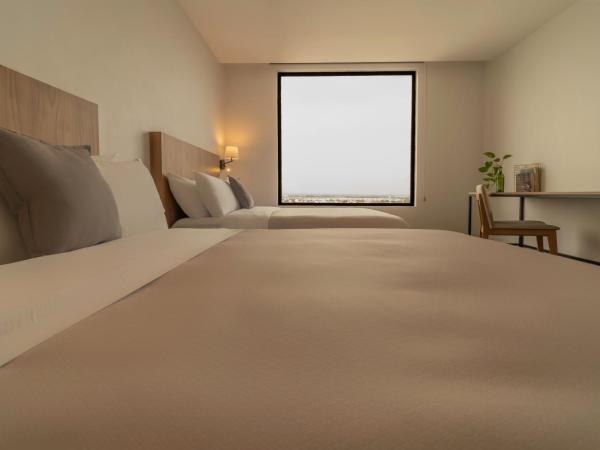 Stadía Suites Querétaro Centro Histórico : photo 6 de la chambre chambre double deluxe