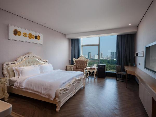 Nan Yang Royal Hotel : photo 4 de la chambre chambre lit queen-size de luxe - vue sur jardin