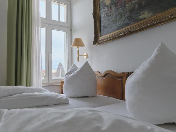 Jahrhunderthotel Leipzig : photo 5 de la chambre chambre triple