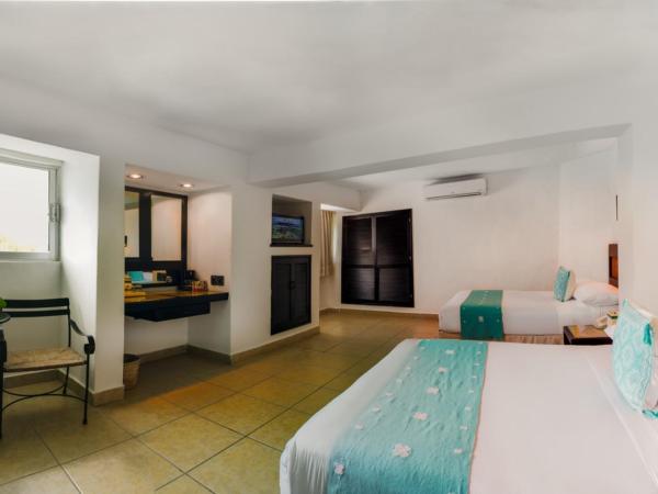 Hotel B Cozumel : photo 2 de la chambre chambre double avec vue sur la jungle