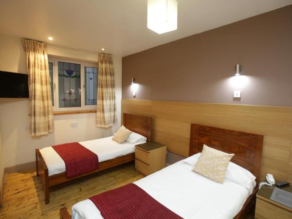 The Merchant City Inn : photo 3 de la chambre chambre lits jumeaux