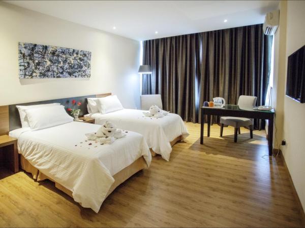 Cathayana Hotel Kuantan : photo 1 de la chambre chambre lits jumeaux supérieure