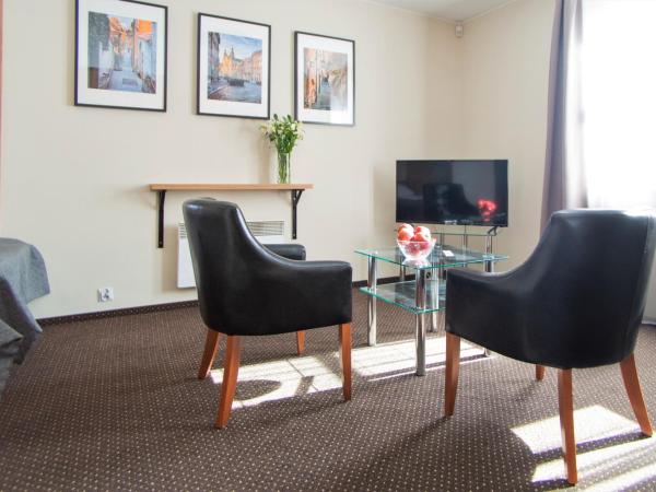 Warsaw Apartments - Apartamenty Sadyba : photo 1 de la chambre appartement avec 1 lit simple