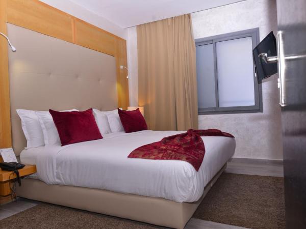 Le 135 appart hotel : photo 4 de la chambre appartement - vue sur jardin