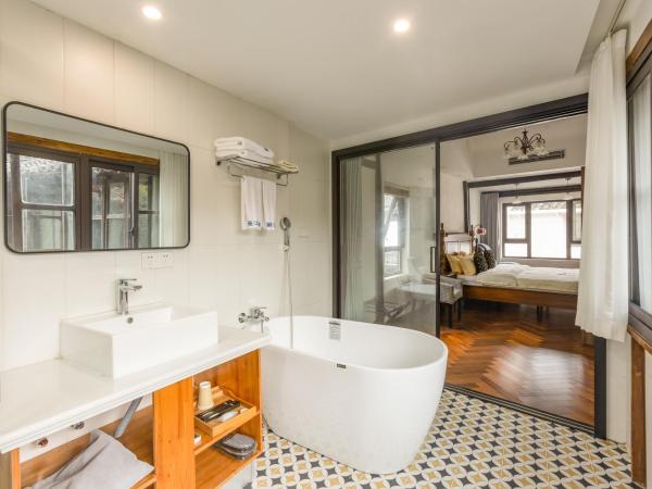 Tongli 1917 Best South Inn : photo 5 de la chambre fate garden view room