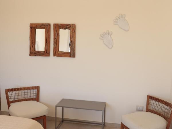 CORALLI DEL PLEMMIRIO : photo 2 de la chambre suite deluxe avec baignoire spa