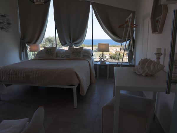 CORALLI DEL PLEMMIRIO : photo 5 de la chambre chambre lit queen-size - vue sur mer