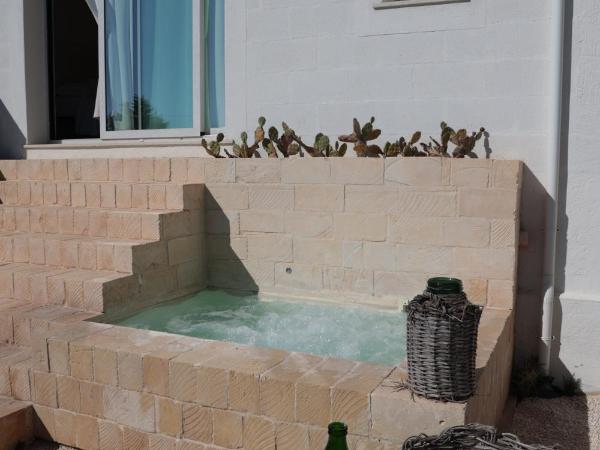 CORALLI DEL PLEMMIRIO : photo 6 de la chambre suite deluxe avec baignoire spa