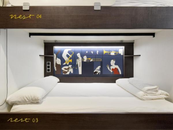 Free Hostels Barcelona : photo 1 de la chambre chambre quadruple