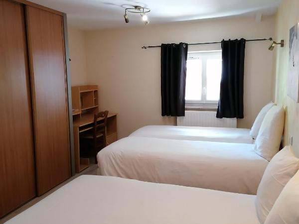 Hôtel Le Lievre Blanc : photo 1 de la chambre chambre quadruple